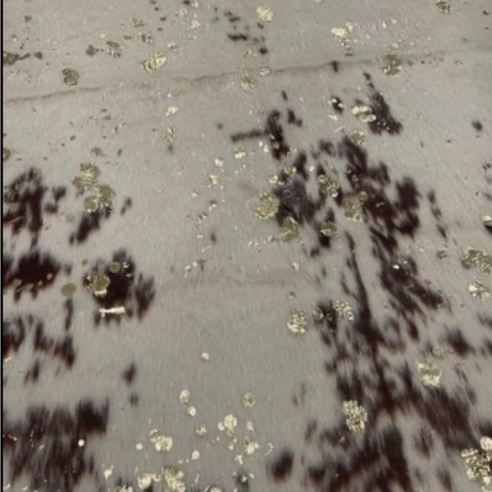 Faux cowhide rug